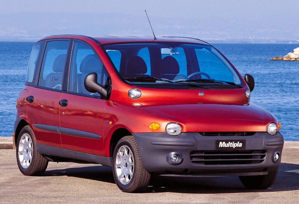 The Fiat Multipla, often cited among the ugliest cars of all time, showcases a bulbous front end and unique roofline that draw criticism.