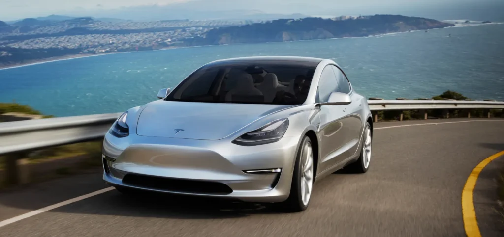 2025 Tesla Model 3 in sleek design with updated headlights and streamlined nose.